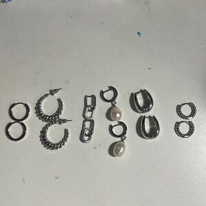 6 pairs of silver hoop earrings
